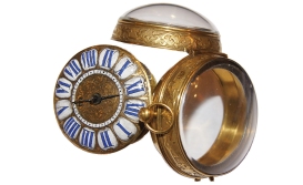 A large oignon watch with enamelled face, gilded case, chiselled with acanthus leaves and other plant motifs. Centre winding. The model is signed GLORIA à Rouen (recognised watchmaker, referenced in 1696). Private collection.