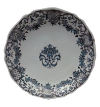 The whole meal was to be served on a white ceramic dinner service decorated with a pale blue border. It complemented the deep blue table centrepiece loaded with figs and pomegranates. From The Laws of Time, a novel by Andrea Perego Image: Bowl with decoration "à lambrequins" (mantling) Fayence. Rouen, ca 1720 Berlin, Kunstgewerbemuseum Photo ©AndreaPerego