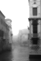 Catterina walked over to the casement and looked out at the wan motionless canal, at the massive rugged façade of Misericordia, at the rio in front and the rooftops surrounding it. The pale damp sky muffled every contrast. All was still, if not for two boats passing beyond the bridge. A veil of dissatisfaction fell over her as she considered that this was just the start of the cold season and that she had months of wintry shadows ahead. She felt a vaguely bitter irritation. She opened the window a little, breathed in the smell of the sea and felt the biting cold chill her hands and face. From The Laws of Time, a novel by Andrea Perego Photo ©AndreaPerego