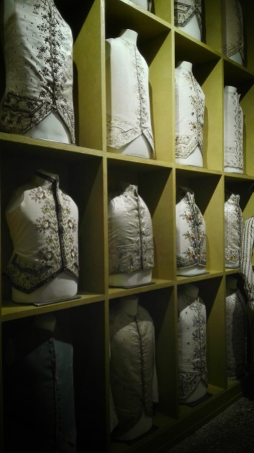 A wardrobe of camisiole, the sleeveless vest worn under the tailcoat, exhibited at the Museum of Palazzo Mocenigo in Venice.