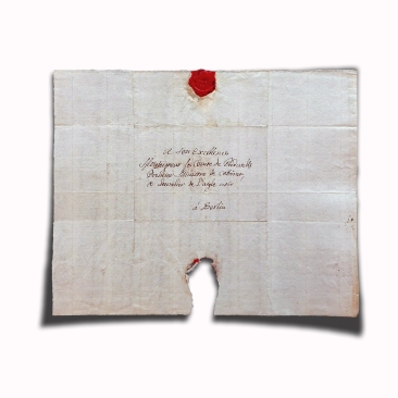 In the 1700s they closed their letters with a seal. In this picture, it is very clear how it was done: the sheet was folded in three, and then again in three. The last flap overlapped, but not entirely, leaving space to affix the wax seal that closed the document. What was the seal for? Obviously, to make sure the letter was not opened during its journey. It was only possible to open the letter by breaking the seal, and the recipient would have noticed it.The seal also served as a guarantee of the sender, whose insignia was stamped on the wax. This seal is of red sealing wax, which was a mixture of shellac and resin with the addition of coloured dyes. The seal is adherent i.e., it fixed directly onto the document support, in this case paper. Photo ©AndreaPerego